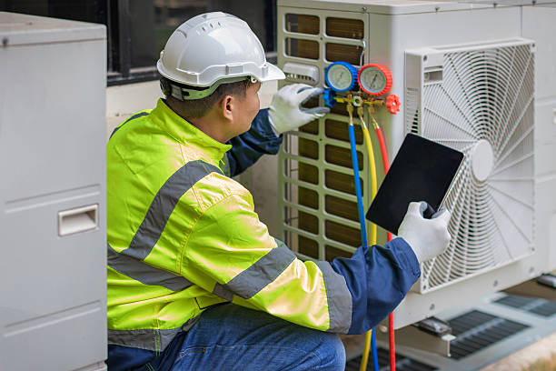 Professional Ac Installation technician working in Lattimore, NC